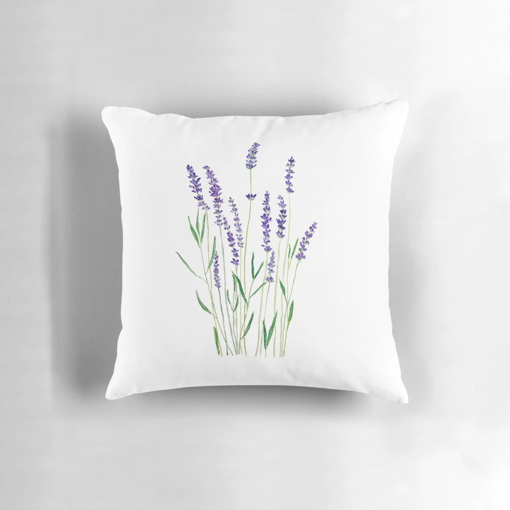 Handpainted lavender and purple floral design on a decorative throw pillow