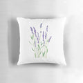 Handpainted lavender and purple floral design on a decorative throw pillow
