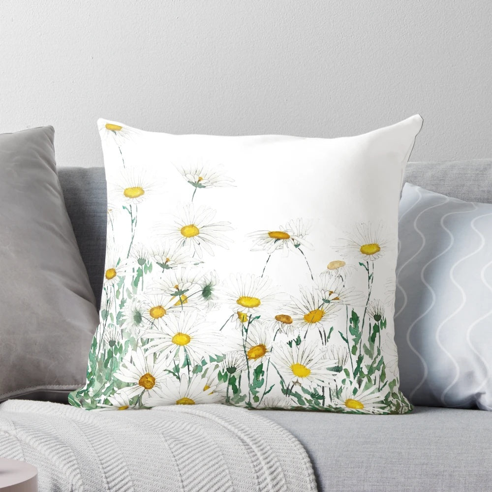 Handpainted white daisy watercolor artwork on a decorative throw pillow