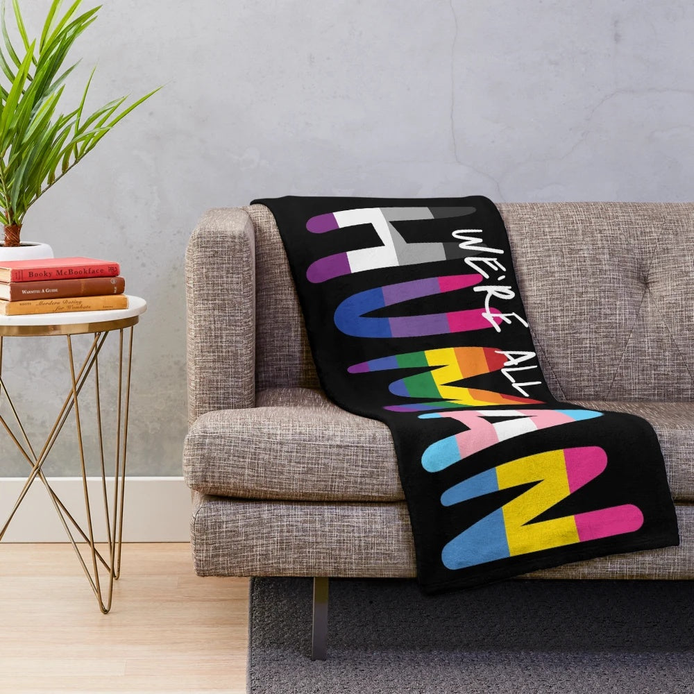 Handwritten flags plush blanket featuring a colorful striped pattern