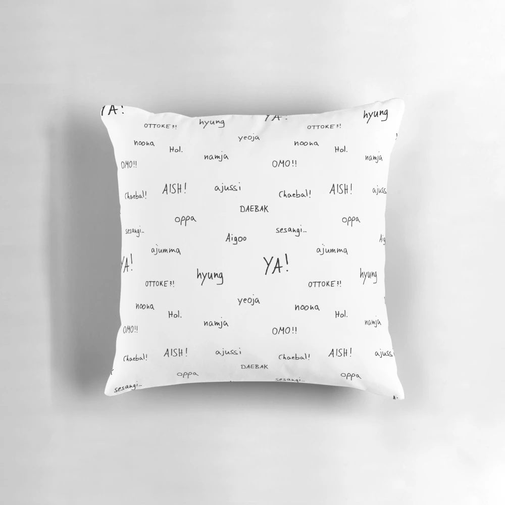 A black and white minimalist pillow with handwritten Korean vocabulary words, perfect for Korean drama and K-pop enthusiasts.
