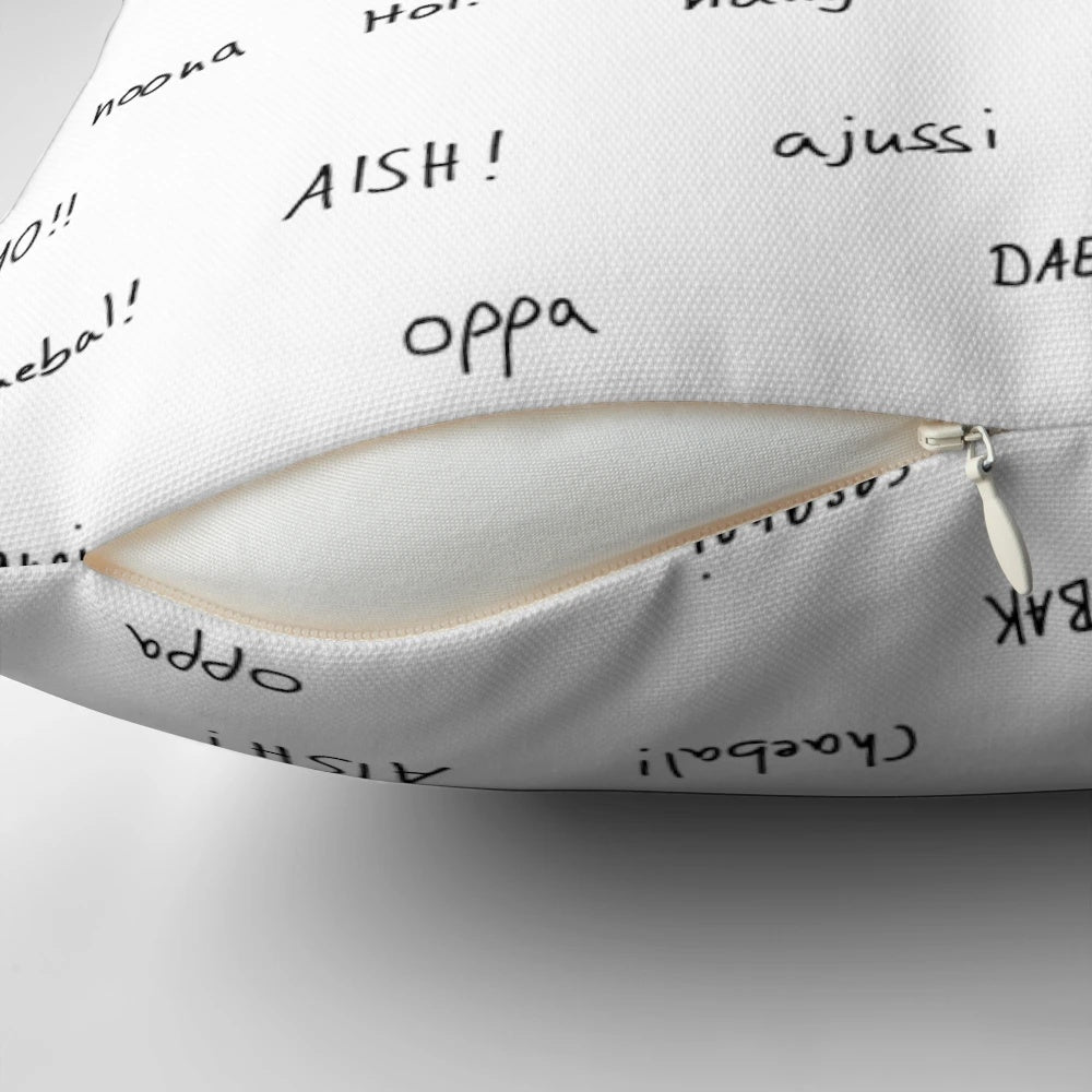 A black and white minimalist pillow with handwritten Korean vocabulary words, perfect for Korean drama and K-pop enthusiasts.