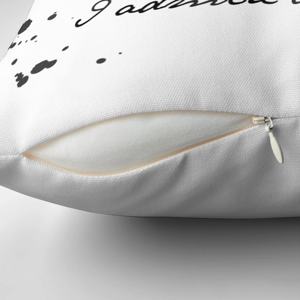 Decorative pillow featuring a handwritten quote from the classic novel "Pride and Prejudice" by Jane Austen.