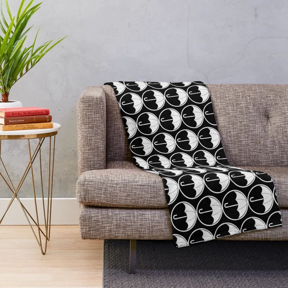 White plush blanket with Umbrella Academy Hargreeves family design