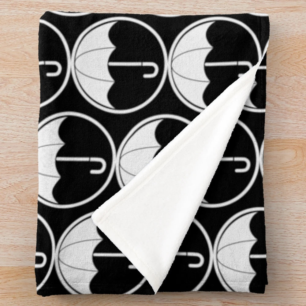 White plush blanket with Umbrella Academy Hargreeves family design