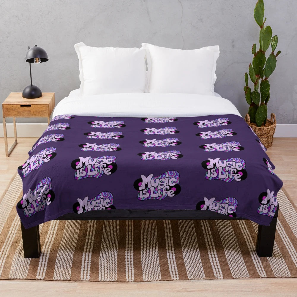 Music lover plush blanket featuring a trippy vinyl record design