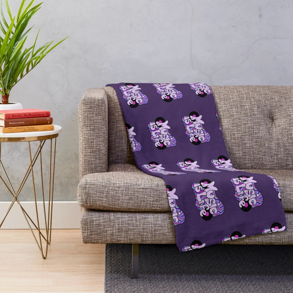 Music lover plush blanket featuring a trippy vinyl record design