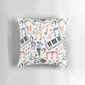 Decorative throw pillow featuring a design of music notes and symbols in a black and white color scheme.