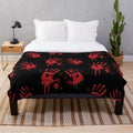 Bloody handprints plush blanket with a scary, horror-inspired design