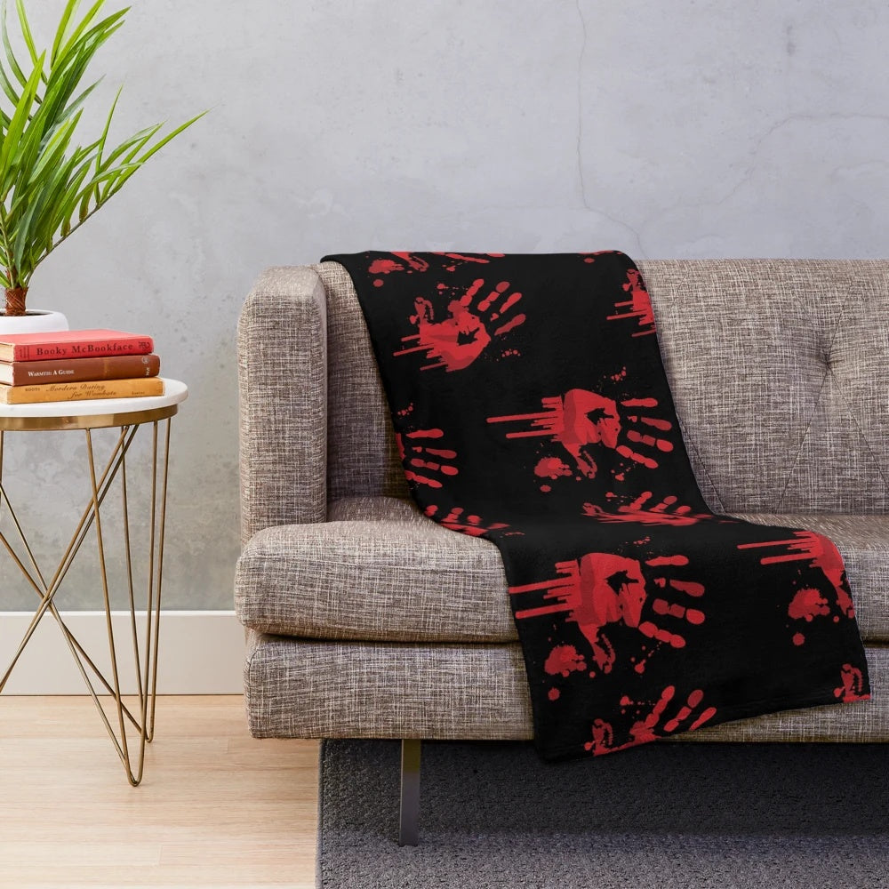 Bloody handprints plush blanket with a scary, horror-inspired design
