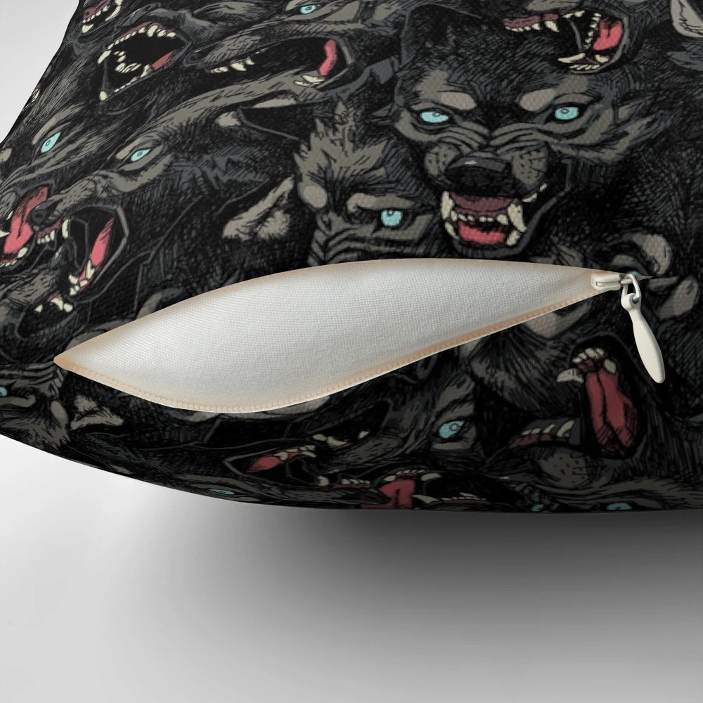 A grey and black wolf pack pattern pillow with snarling timber wolves
