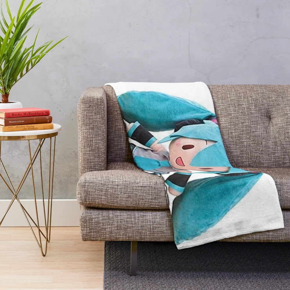 Hatsune Miku plush-style blanket featuring the popular vocaloid character