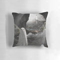 Haunted cave pillow with ghostly imagery and atmospheric ocean scenery