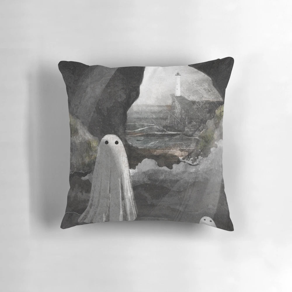 Haunted cave pillow with ghostly imagery and atmospheric ocean scenery