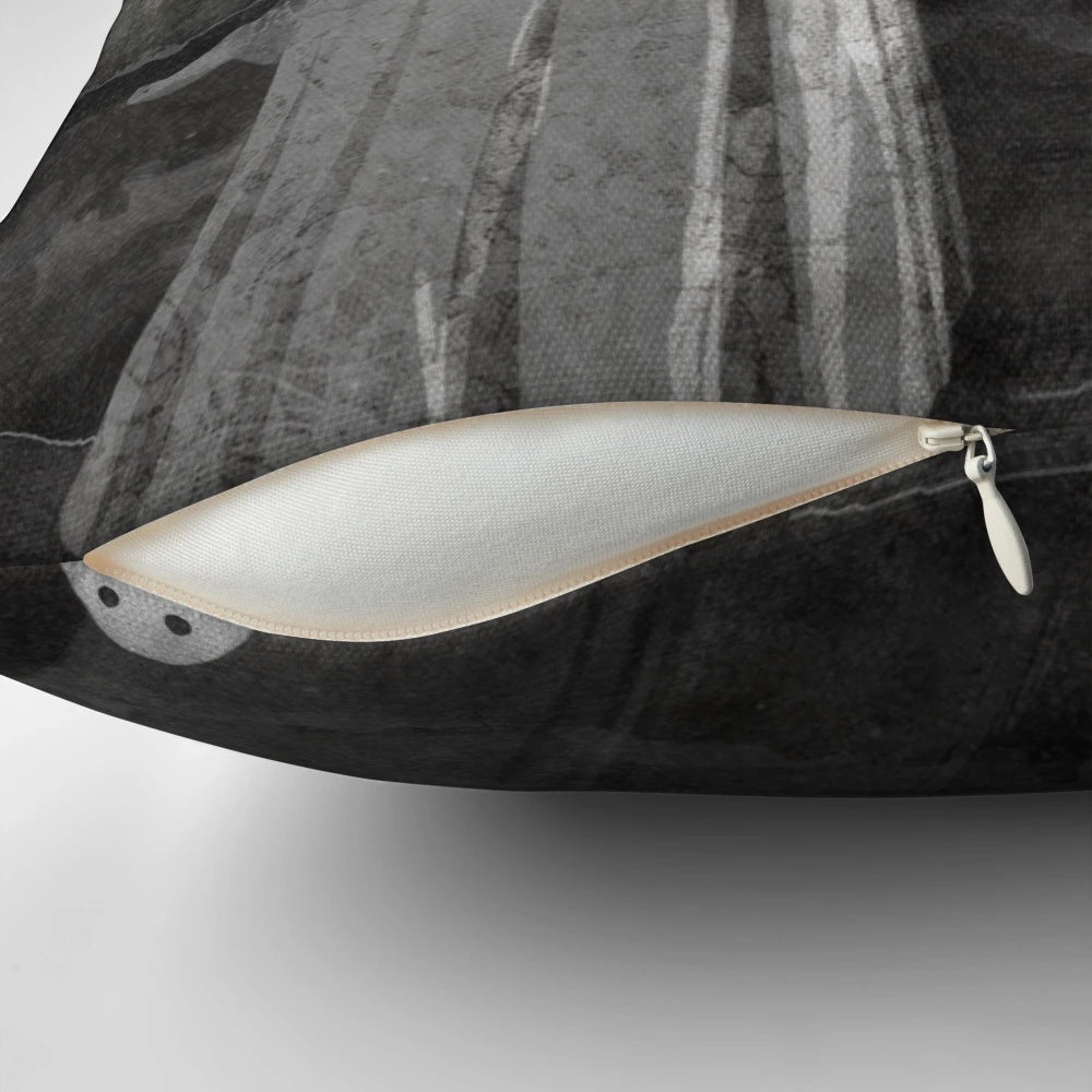 Haunted cave pillow with ghostly imagery and atmospheric ocean scenery
