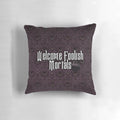 A cozy pillow featuring the "Welcome Foolish Mortals" text from the Haunted Mansion ride at Disney parks.
