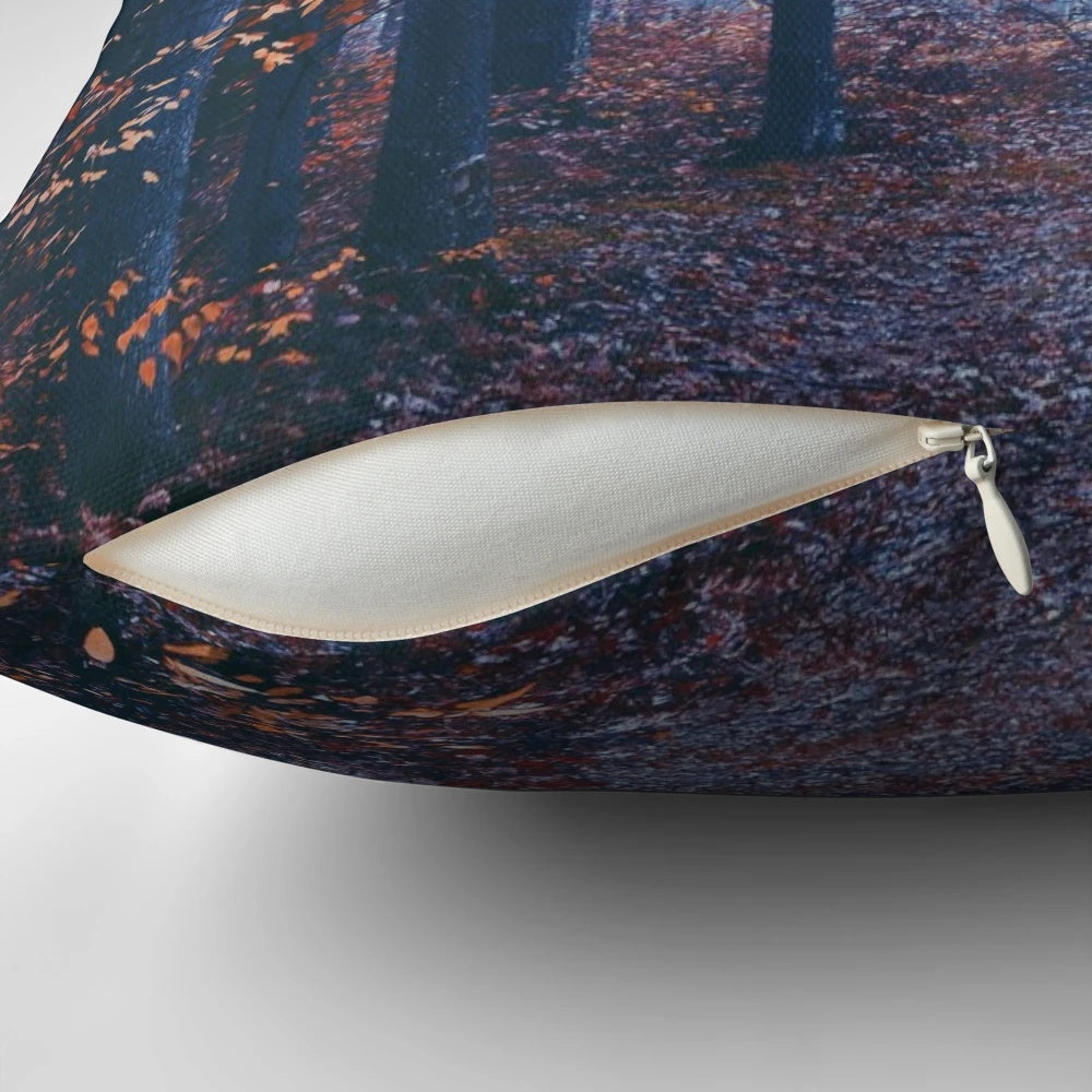 A haunting autumn landscape with a misty, foggy forest and dark, moody atmosphere.