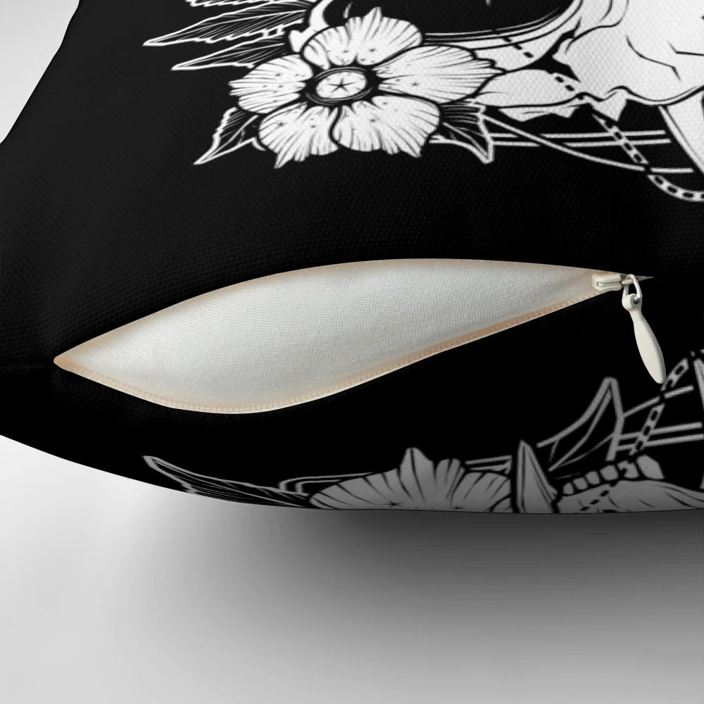 A Pillow featuring a cat skull intertwined with beautiful, dark flowers and botanical elements.