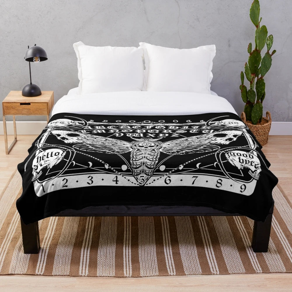 Death Moth Plush Blanket featuring a creepy, gothic moth design