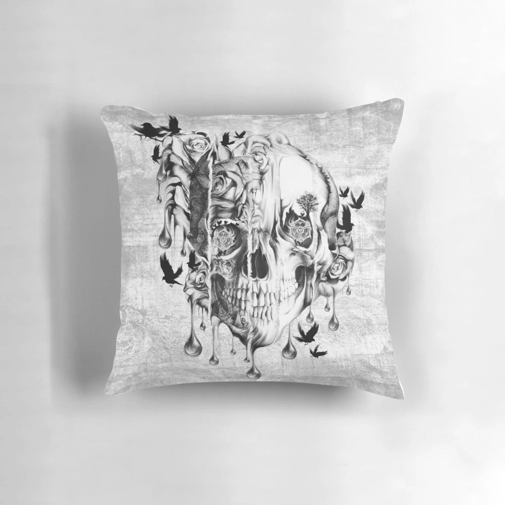 Melting skull pillow with gothic floral accents