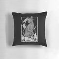 A Spooky Occult Cat Pillow with a Skull and Candle Design