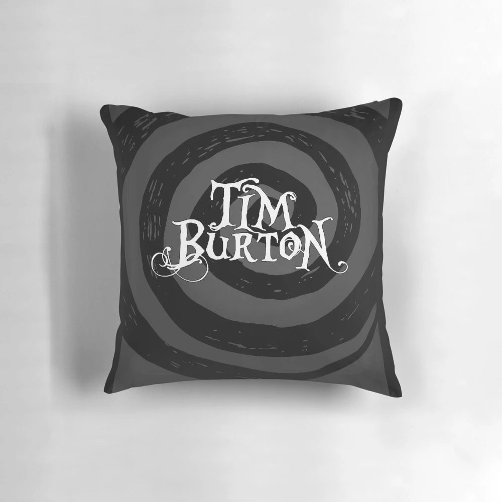 A black and white pillow featuring a gothic, minimalist design inspired by the films of Tim Burton