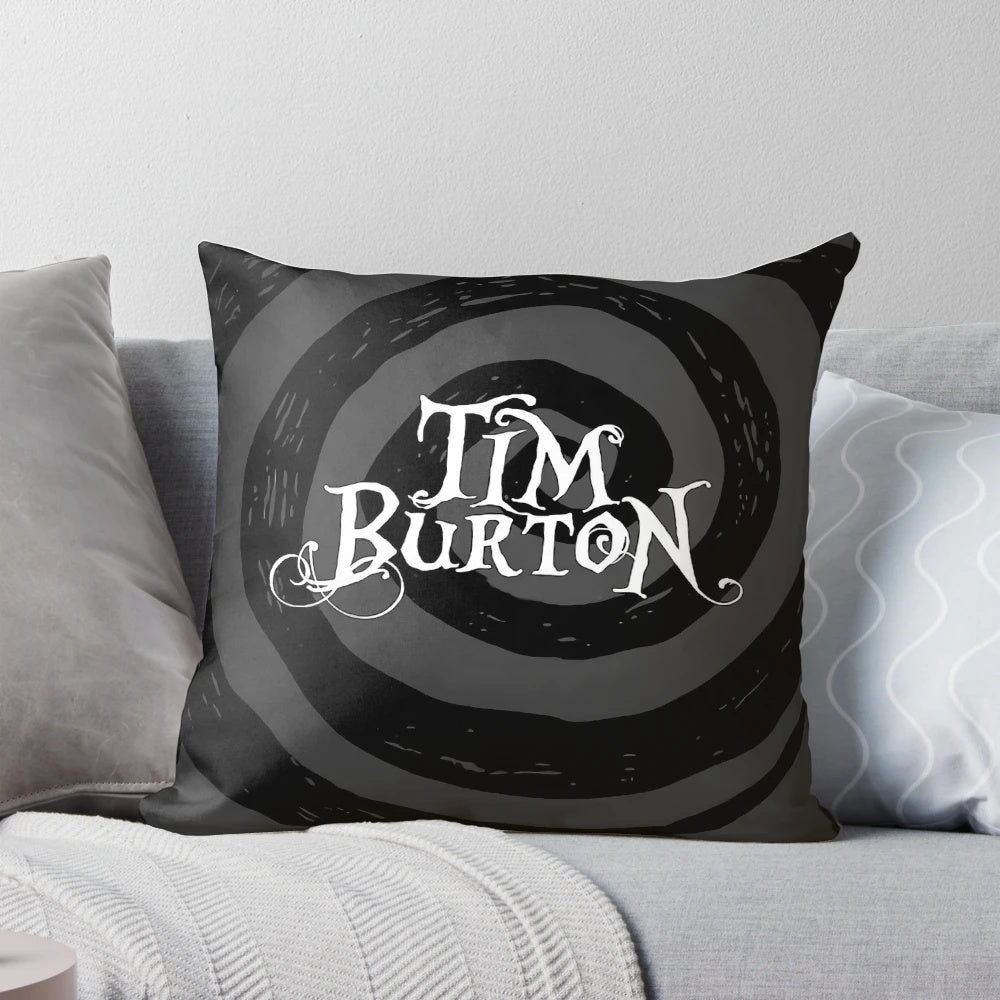 A black and white pillow featuring a gothic, minimalist design inspired by the films of Tim Burton