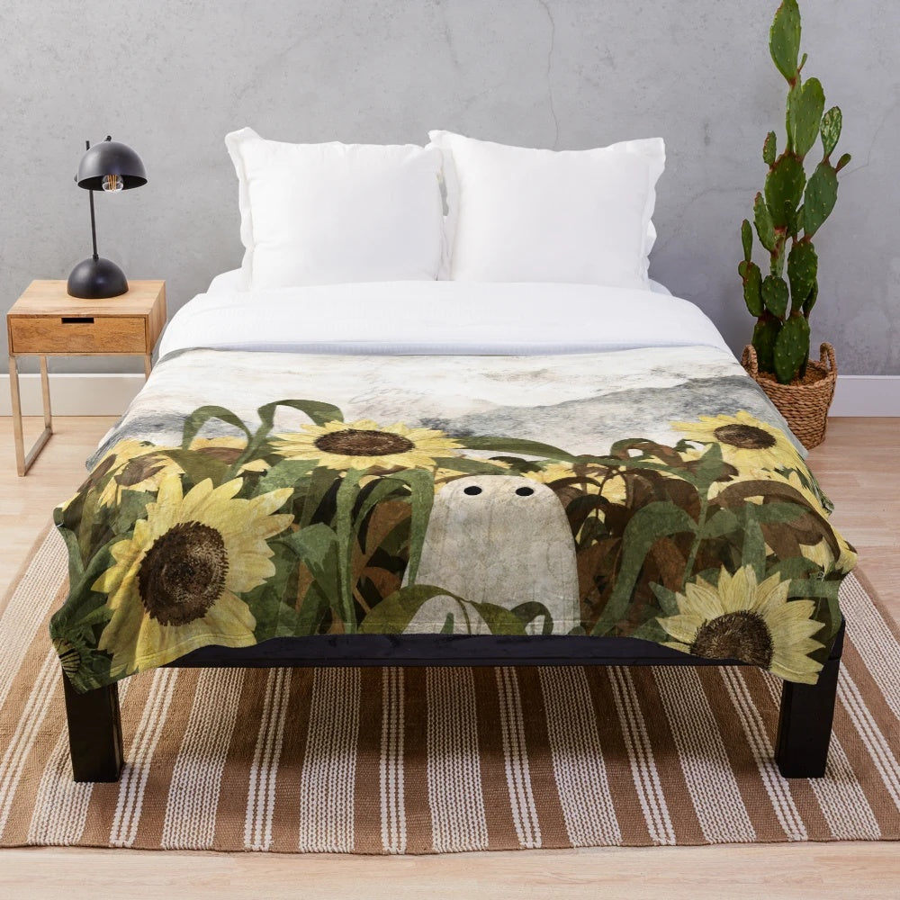 Plush blanket with a ghostly sunflower field design