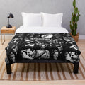 Vintage-inspired horror plush blanket featuring classic monster illustrations