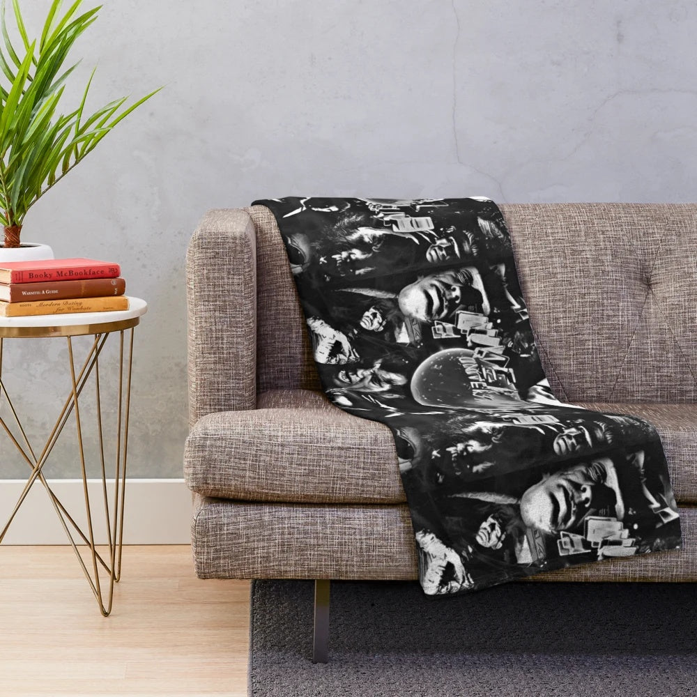 Vintage-inspired horror plush blanket featuring classic monster illustrations
