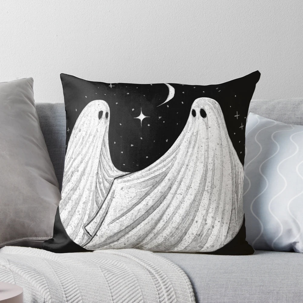 Spooky and romantic gothic-style pillow featuring ghostly embracing couple