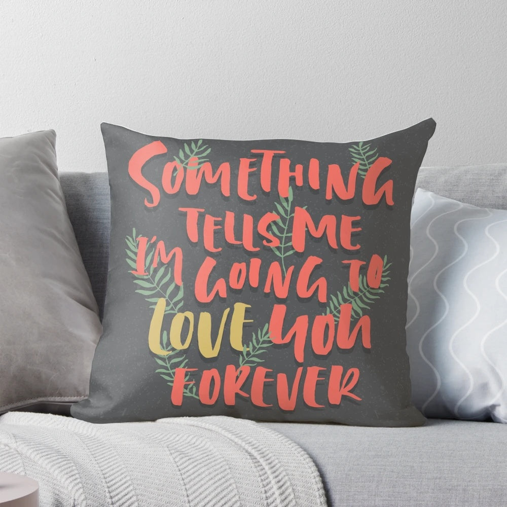Cozy heart-shaped pillow with a handwritten "I Love You Forever" quote and decorative leaf design