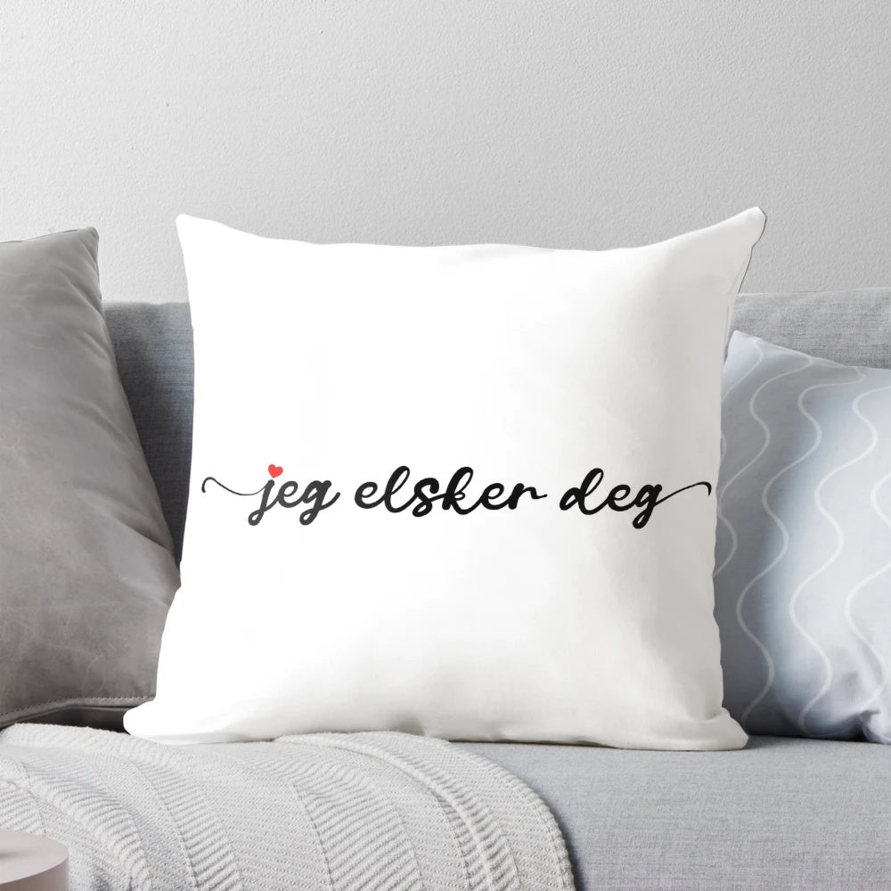Calligraphy pillow with the Norwegian phrase "Jeg elsker deg" meaning "I love you