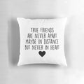 Pillow with calligraphic "True friends are never apart" design and heart accents
