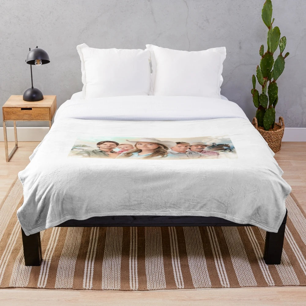 Heartland plush blanket with family and horses
