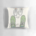 Heartstopper-themed pillow with an illustration of two boys wearing "boy meets boy" style shoes