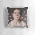 A cozy and stylish Heartstopper inspired pillow featuring Kit Connor's character Nick Nelson with a floral design.