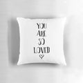 Soft, plush pillow featuring a hand-lettered "You Are So Loved" typography quote design