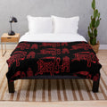 Heavy metal death logo printed on a soft plush blanket