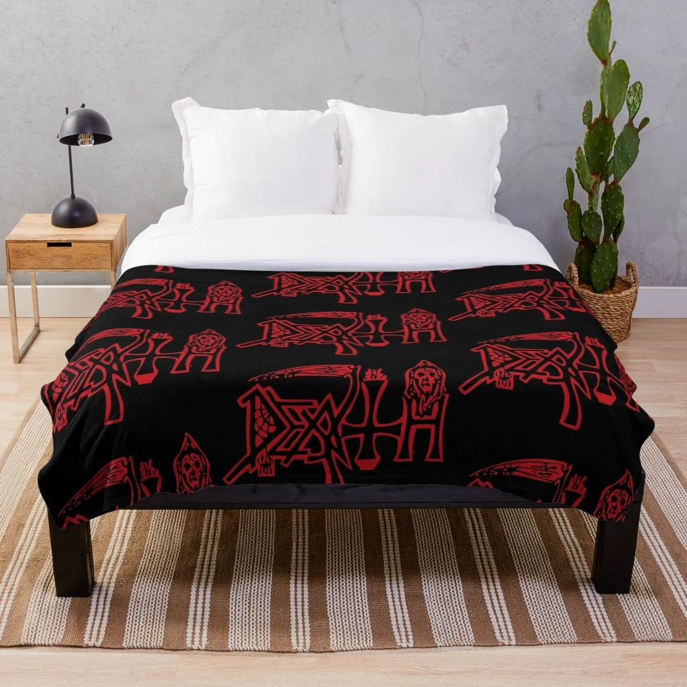 Heavy metal death logo printed on a soft plush blanket