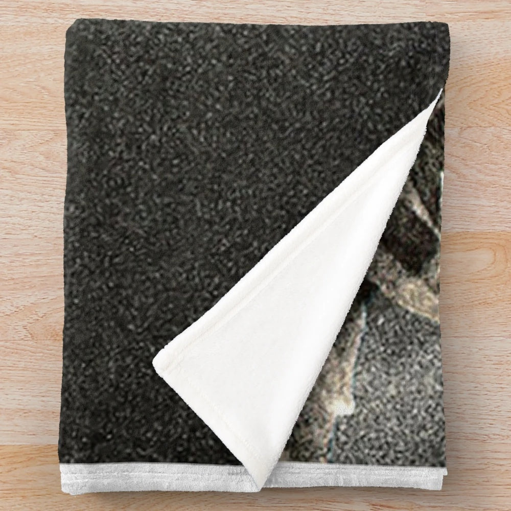 Heavy metal inspired plush blanket featuring the "in for the kill" design