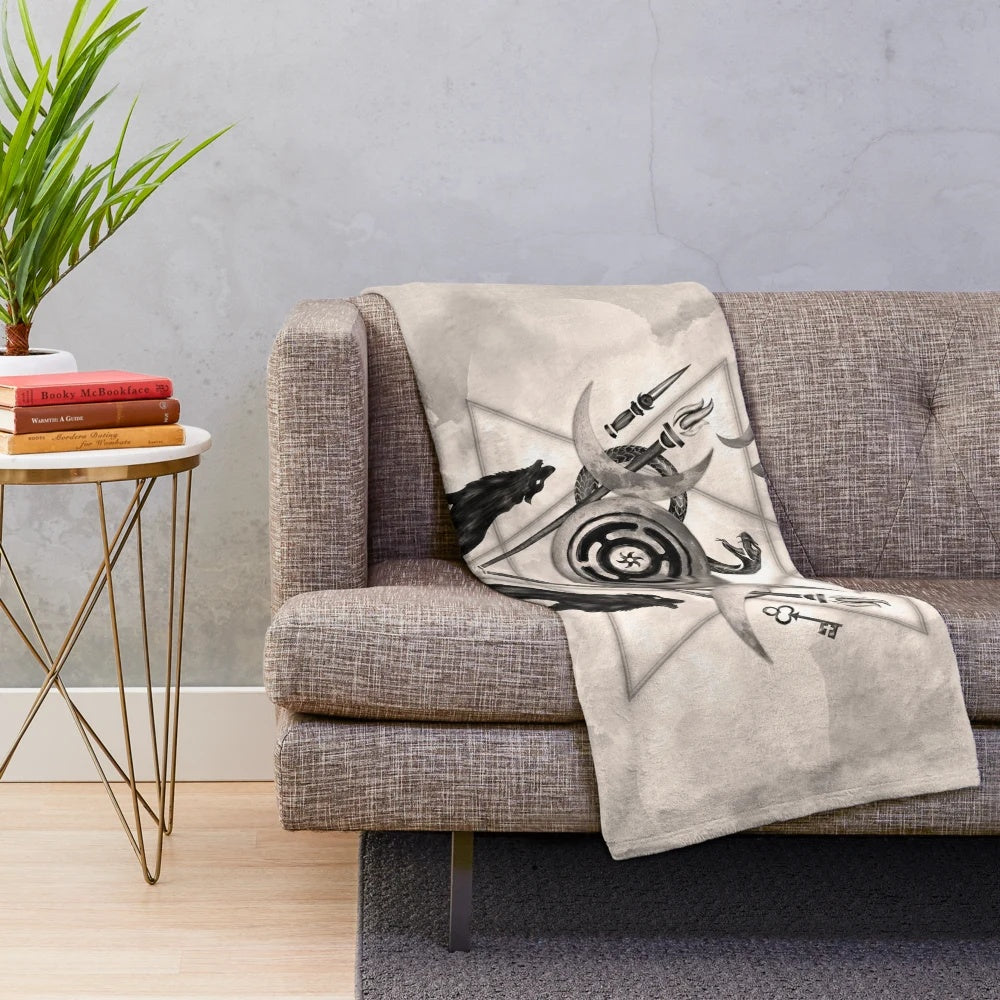 Hecate goddess plush blanket with symbols of the moon, torches, and snakes