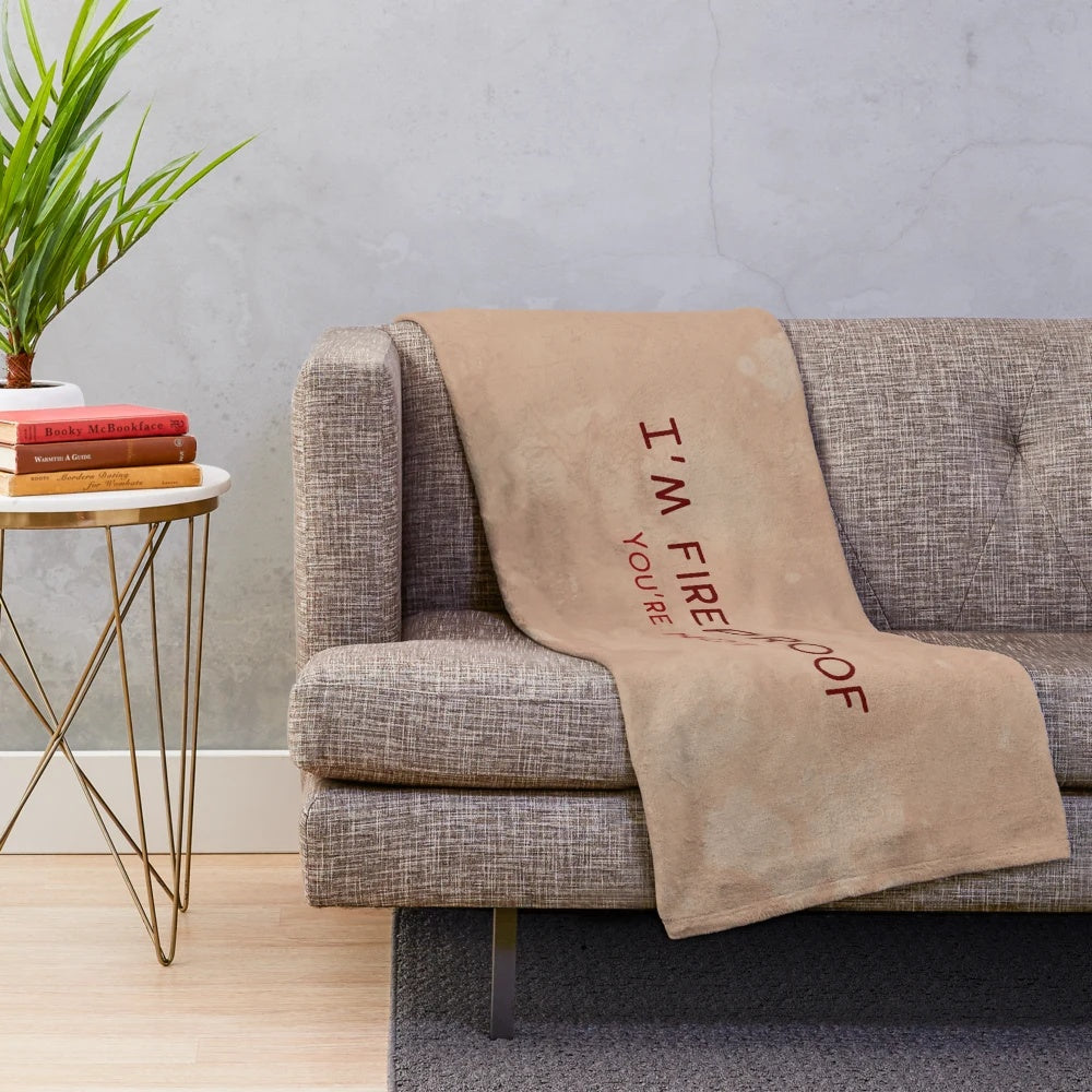 Hellboy-inspired fireproof plush blanket with demon and typography design