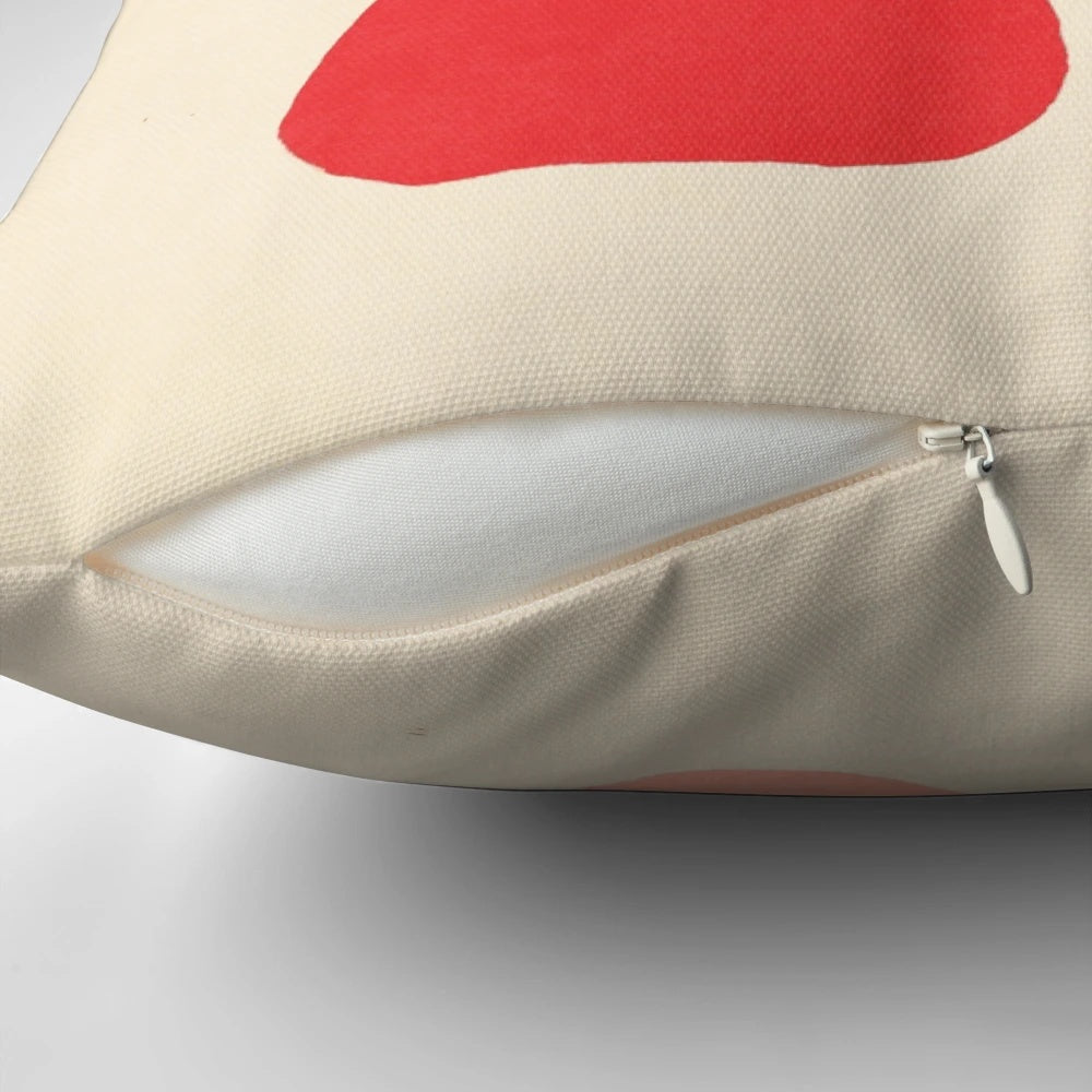 Vibrant throw pillow featuring wildlife motifs in the iconic cut-out style of French artist Henri Matisse
