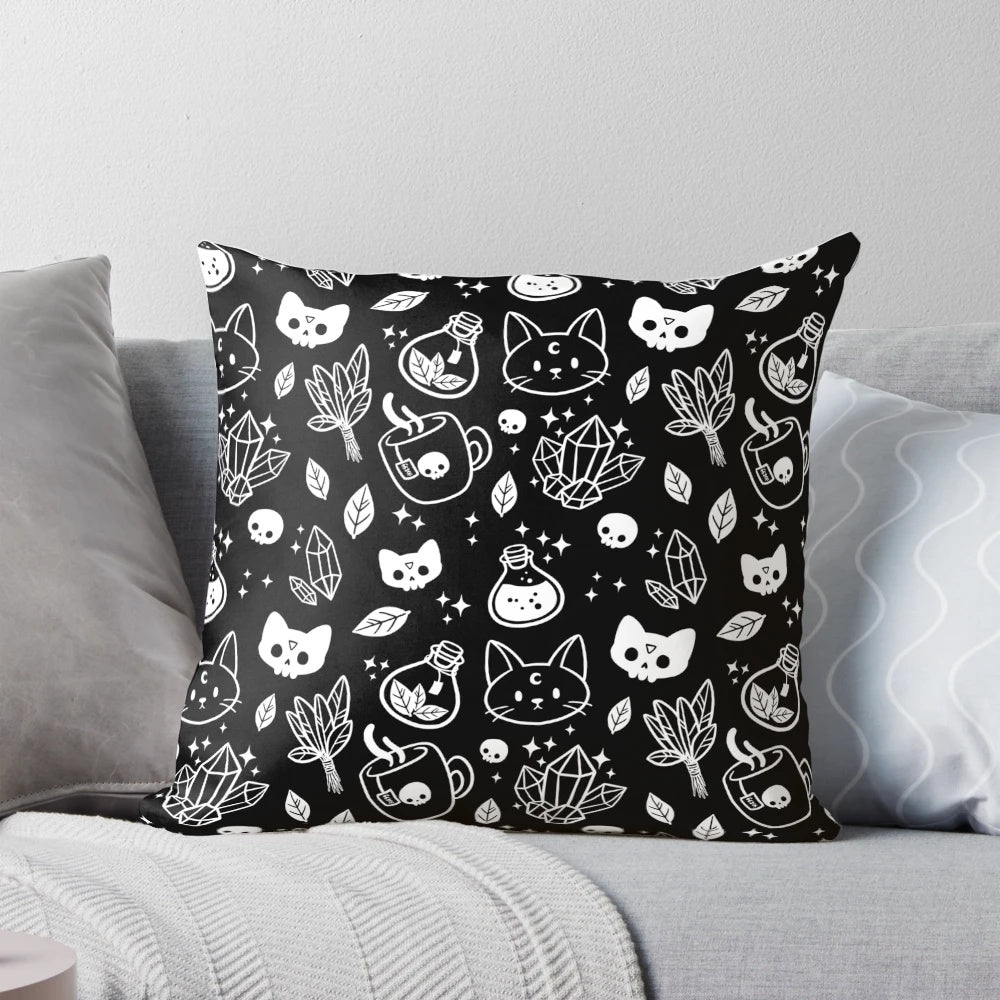 Herb witch design in black and white on a decorative pillow
