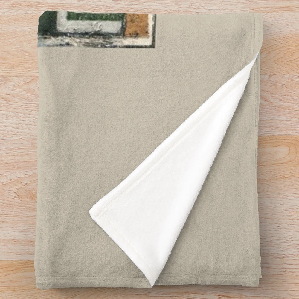 Hibernian FC-inspired plush blanket with the club's colors and logo