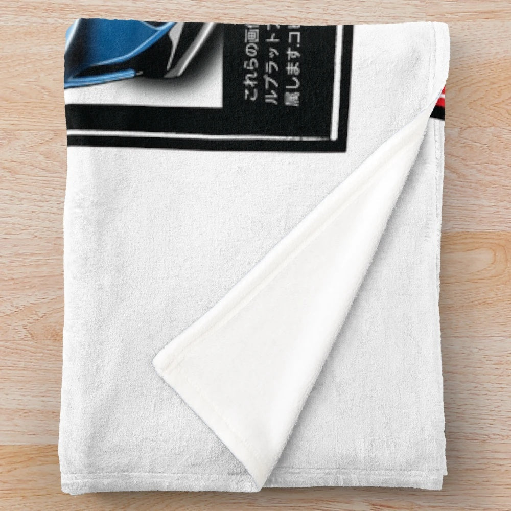 Blue German sports car with open hood on plush blanket