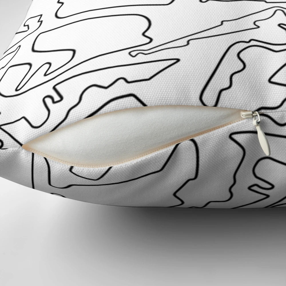 High-quality pillow featuring a design of race tracks against a white background, perfect for motorsports enthusiasts.