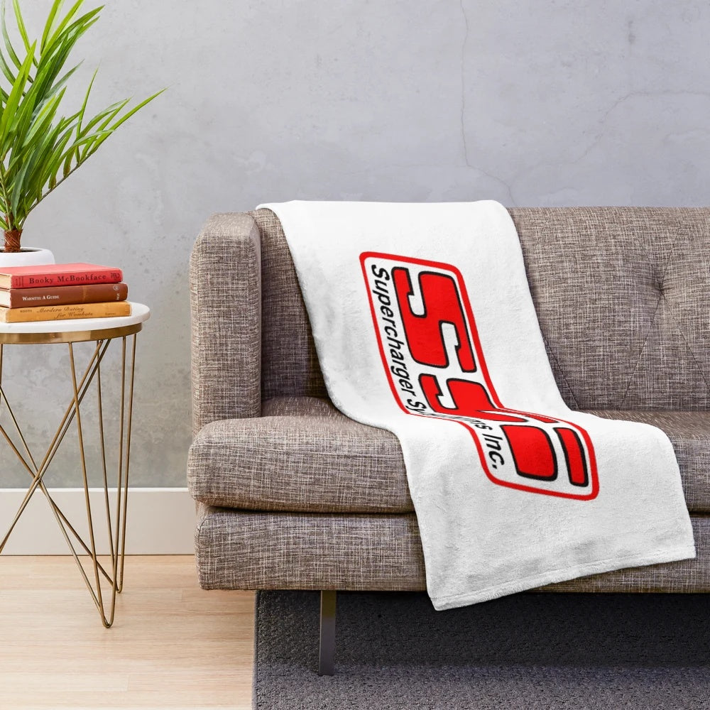 Plush blanket with supercharger-inspired design