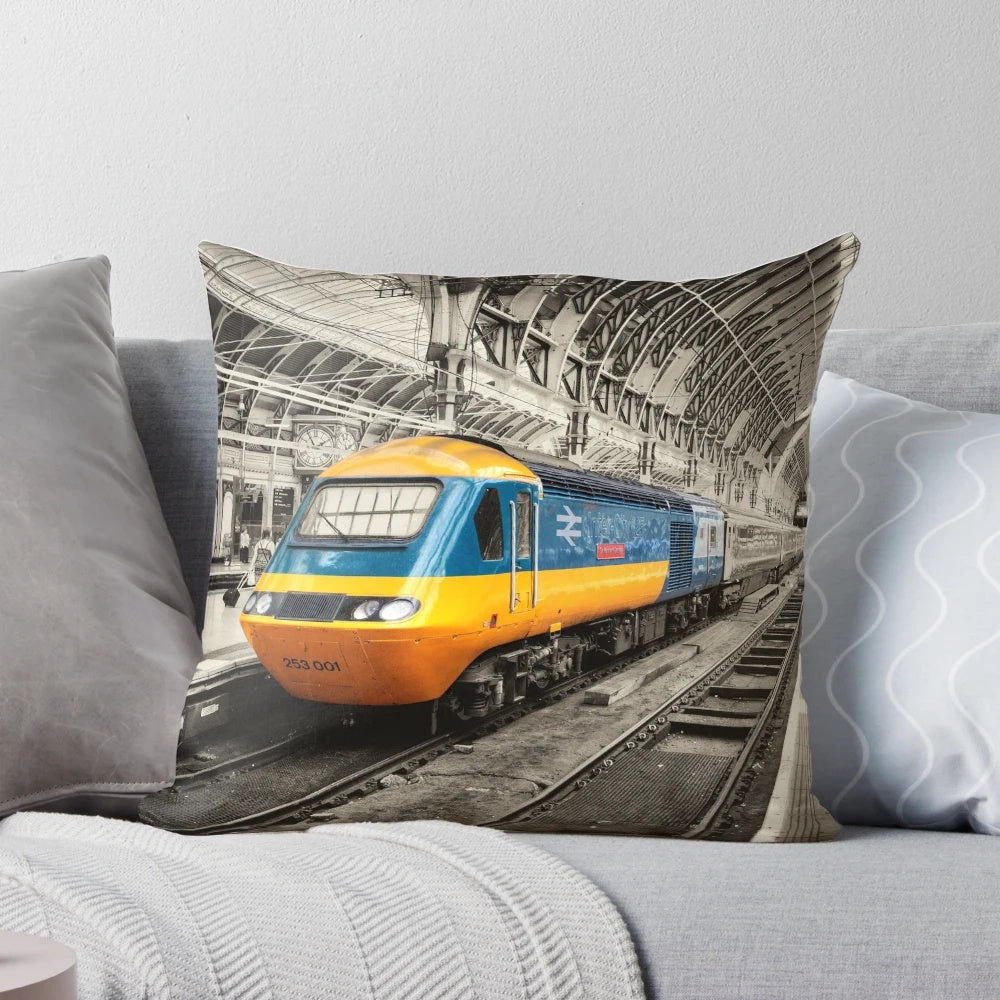 Padded pillow featuring the Paddington station logo and colors, perfect for comfortable high-speed train journeys.